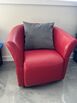 Red Accent Chair / Red Cabinet / Artwork / Clock