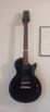 Electric guitar with hardshell case and amp