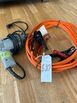 Corded Electric drill. Car booster cables